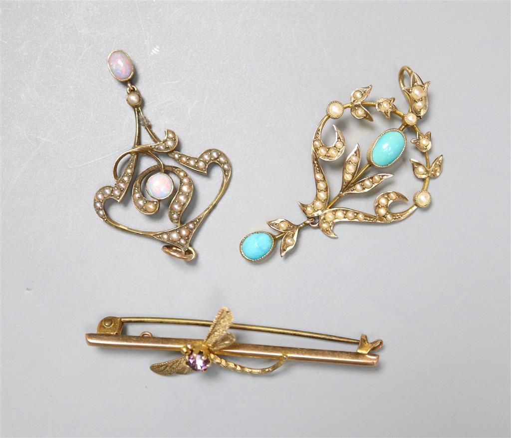Two Edwardian 9ct and gem set pendants and a 9ct and gem set dragonfly bar brooch, gross 5.6 grams.